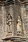 Ta Prohm temple - devatas sculpted on the gallery walls